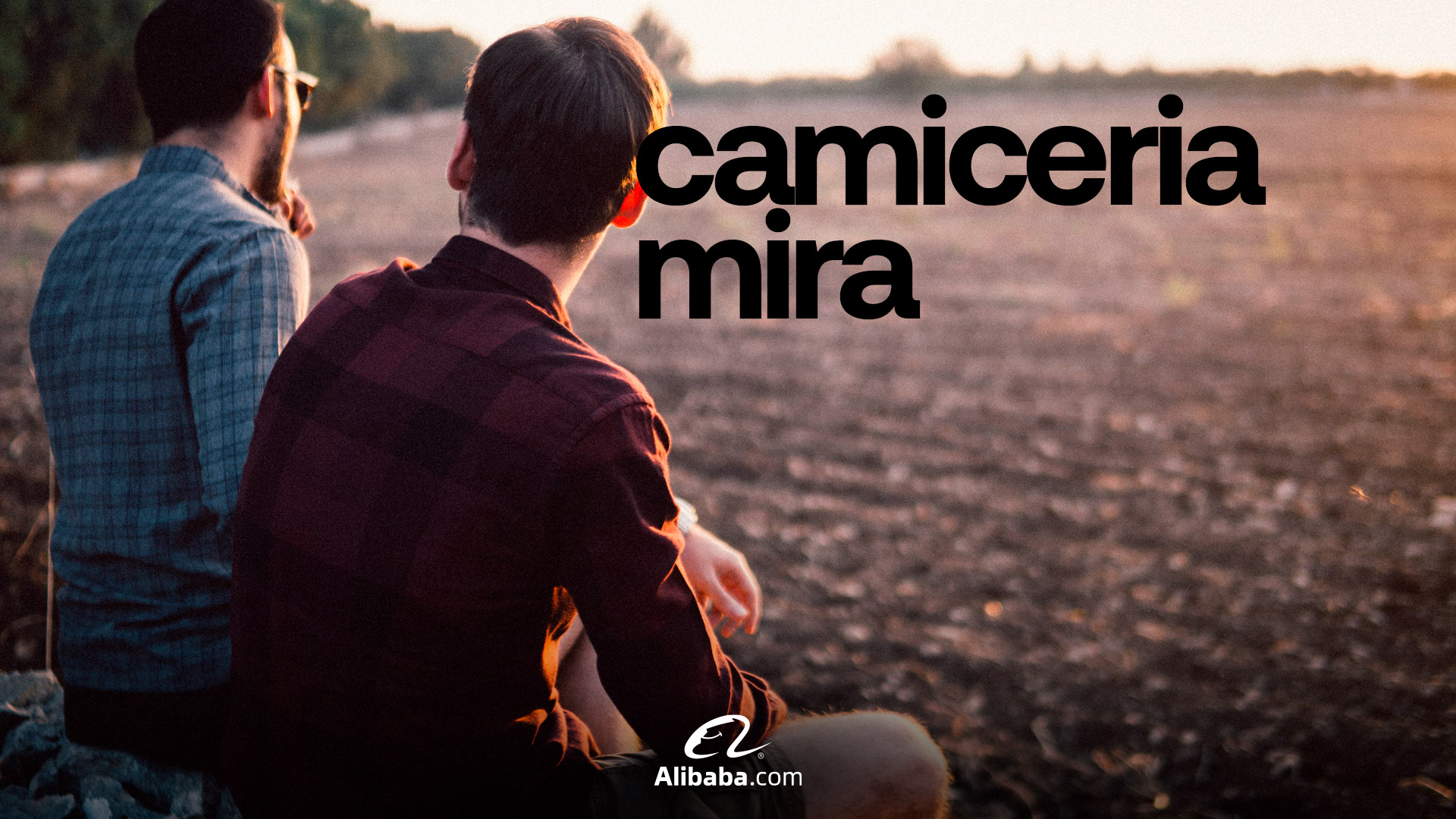 Camiceria Mira per alibaba.com, due ragazzi seduti di spalle con camicia a scacchi